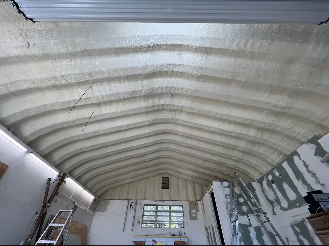Spray polyurethane foam applied to the underside of a metal roof deck in Big Rapids
